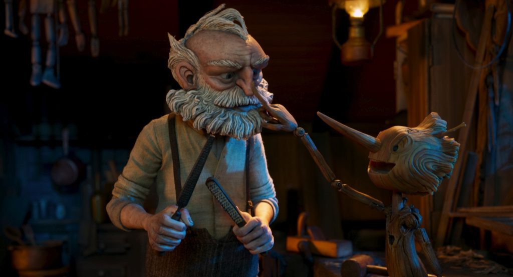 David Bradley als Geppetto en Gregory Mann als Pinocchio