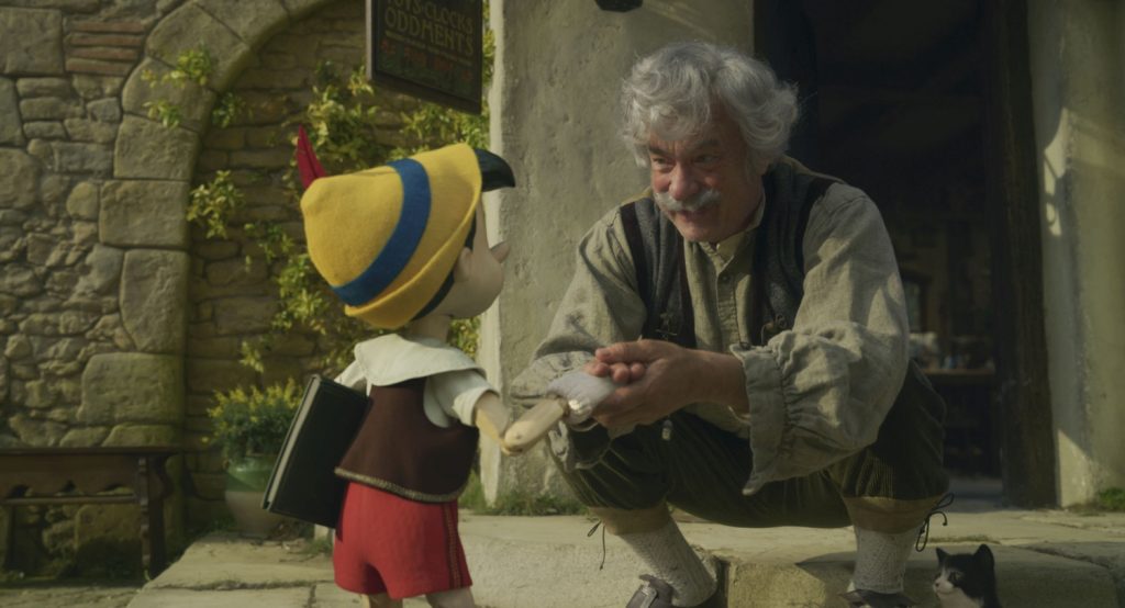 Tom Hanks als Geppetto en Benjamin Evan Ainsworth als Pinocchio